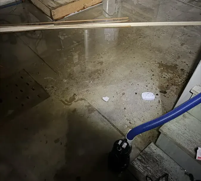 Corroded pipe leak traced at the base of a wall