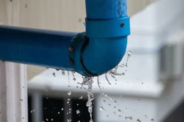 Water dripping from a failed pipe joint